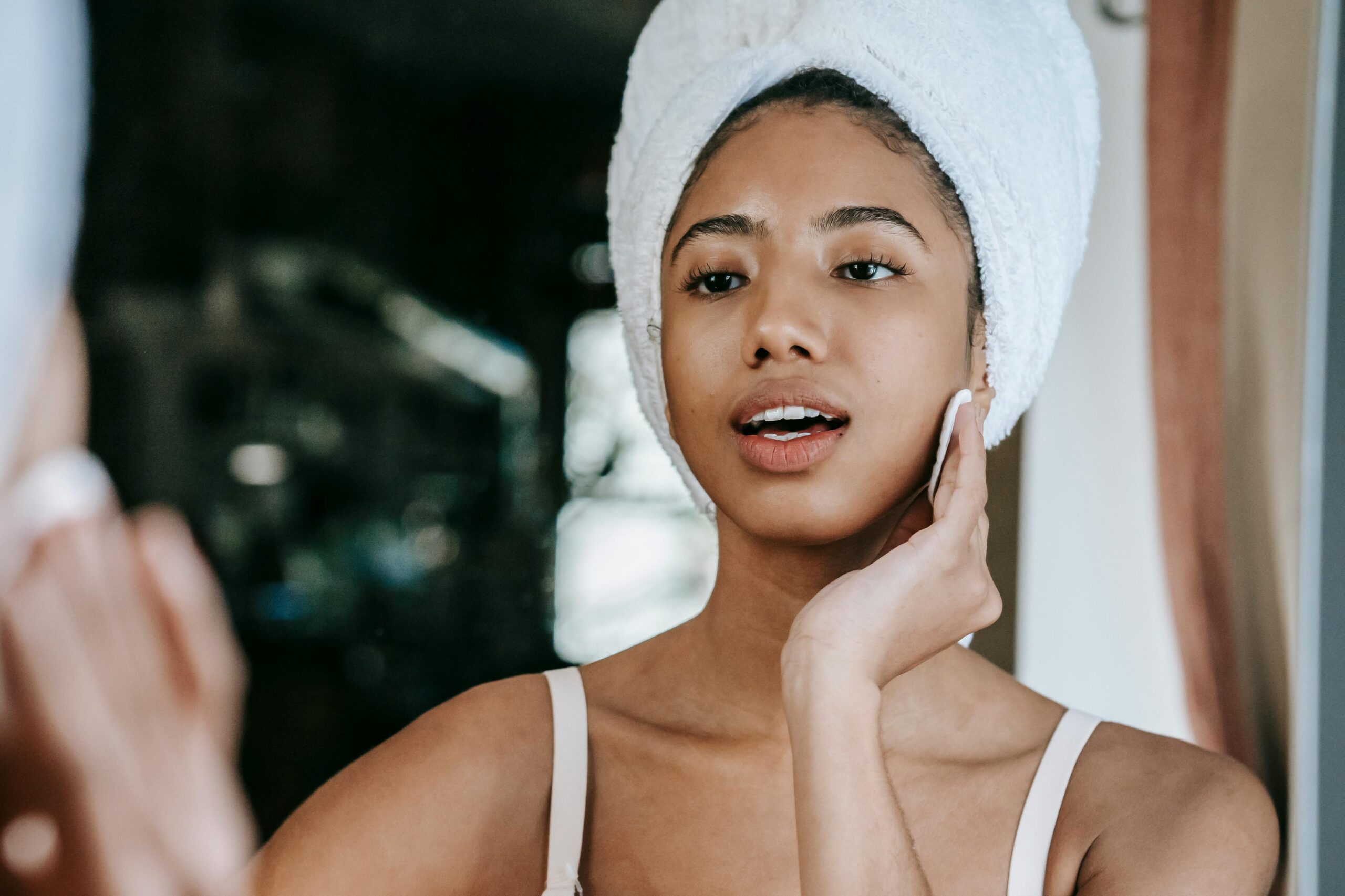 What causes dark spots and hyperpigmentation on the face?