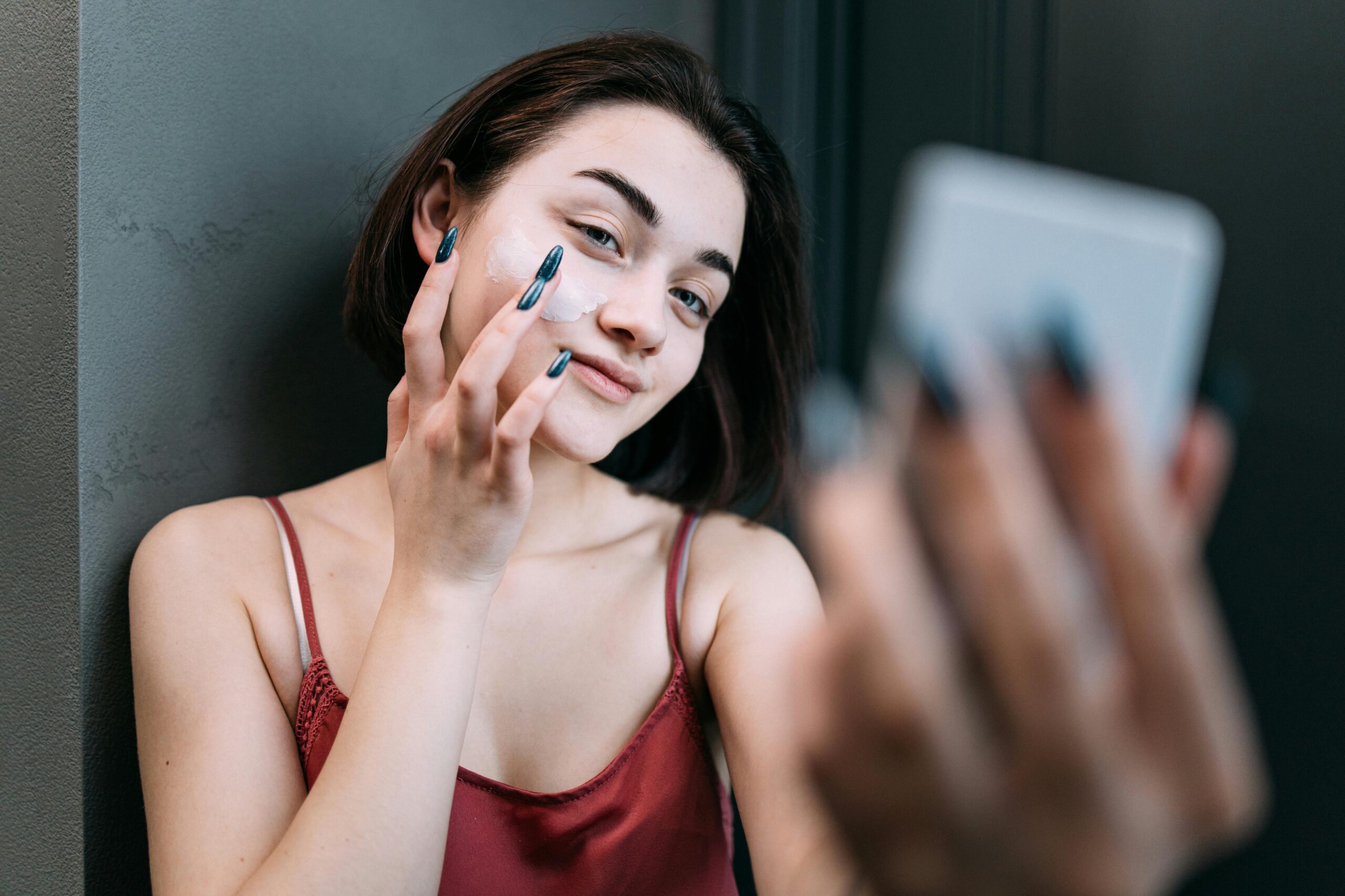 What are free radicals and how do antioxidants protect skin?